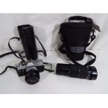 Photography - a Canon FTb camera in case with a Sigma 80 - 200 NM lens also cased (2)