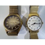 Two gentleman's wristwatches comprising a Seiko automatic 7 jewel watch, gold coloured dial,