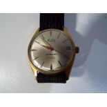 A gentleman's vintage MuDu 25 jewel Swiss Made doublematic wristwatch, baton hour markers,