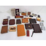 A large quantity of vintage smoking related items to include lighters, cigarette cases,