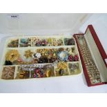 A box, containing a quantity of predominantly vintage costume jewellery to include paired earrings,