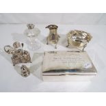 A collection of silver hallmarked items to include George V sugar bowl Chester assay 1913,