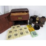 A Magic Lantern with accessories marked Primus,