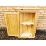 A pine corner unit approx 92cm x 66cm x 35cm Est £30 - £50