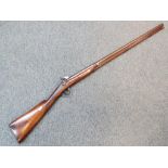 An 18th century hunting percussion long gun, barrel 16 mm or 14 gauge approx.