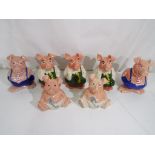 A collection of seven Wade Nat West pigs Est £20 - £40