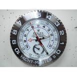 An advertising wall clock, Est £90 - £110.