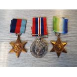 A World War Two (WW2) campaign medal group comprising British War medal, Atlantic Star,