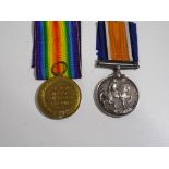 A World War One (WW1) campaign medal group - British War medal and Victory medal inscribed to the