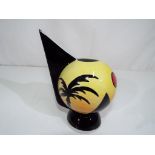 Lorna Bailey - a Lorna Bailey ceramic orb jug in Pyramids pattern approximately 14 cm height,