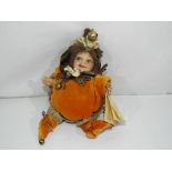 An Italian Montedragone Zucchetta doll with tags,