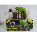 A boxed animated singing telephone in the of a chameleon incoming call animates chameleon and plays