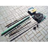 A quantity of fishing equipment to include umbrella, fishing rods including a Milbro Spinwell,