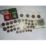 A lot to include a silver proof Silver Jubilee crown, a 1921 $1 coin San Francisco mint,