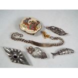 A good mixed lot to include a white metal brooch with center stone inscribed verso NG,