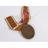 A Deutsches Schutzwall-Ehrenzeichen (Westwall) medal with length of ribbon