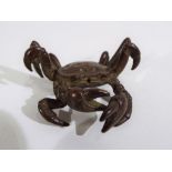 A bronze ornament in the shape of a crab, Est £35 - £50.