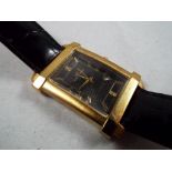 A Lady's good quality wristwatch marked Klaus-Kobec Eminence set with two diamonds,