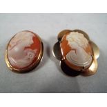 Two hallmarked 9 carat gold cameo brooches with chain connections for pendants,