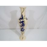 Moorcroft Pottery - a large Moorcroft Pottery slim line vase decorated with blue bells stamped to