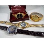 A gentleman's Rotary wristwatch with related ephemera, a gentleman's vintage Timex automatic,