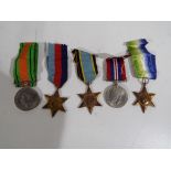 A World War Two (WW2) campaign medal group comprising British War medal, Defence medal,