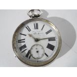 A silver Reliance pocket watch.