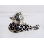 A silver pin cushion in the shape of a duck, Est £30 - £50.