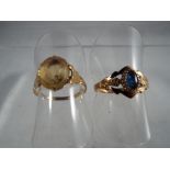 A Lady's hallmarked 9 carat yellow gold ring set with opal,