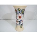 Moorcroft pottery - a Moorcroft pottery vase in Anemone Wild Swan pattern, approximately 20.