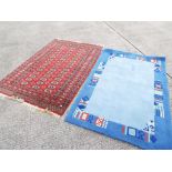 Two rugs with traditional decoration, me