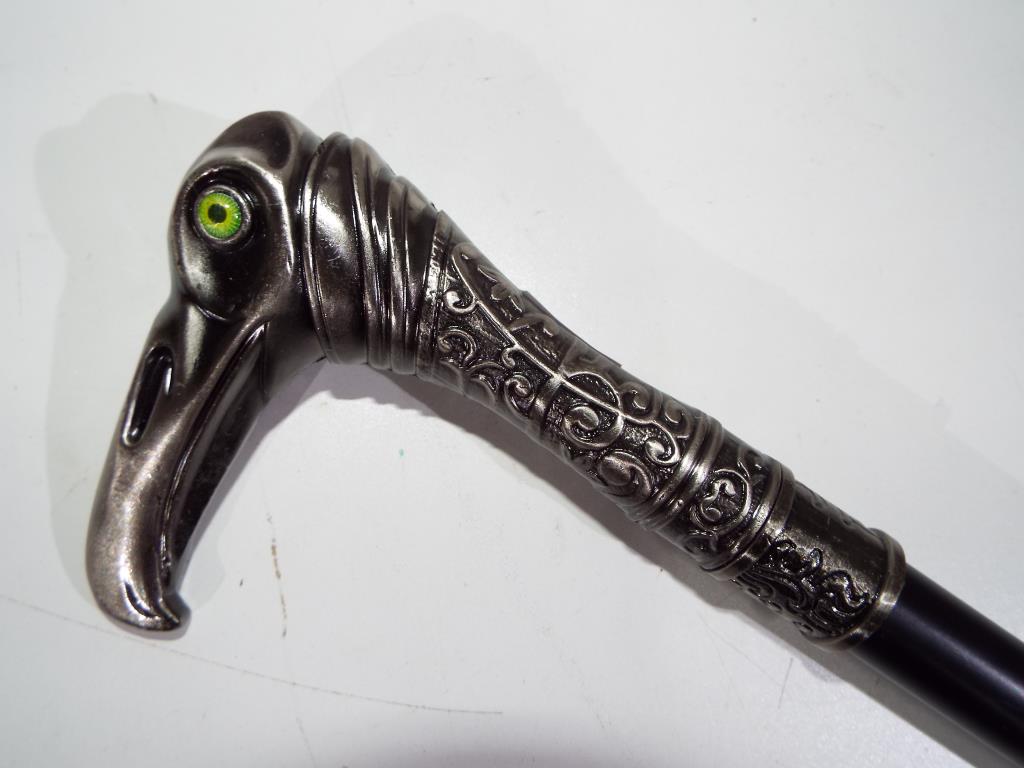A walking stick with an eagle shaped han - Image 2 of 2