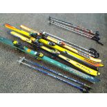 Ski-ing - four sets of skis, two sets of