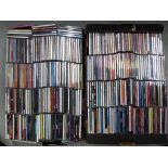 Approximately 300 CD's contained in two