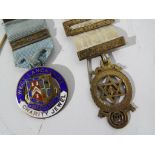 Two silver Masonic medals. Estimate £25