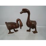 A pair of bronze geese, Est £30 - £50.