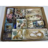 A quantity of predominantly vintage costume jewellery to include pearl necklaces, vintage brooches,