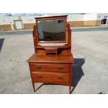 An art nouveau two drawer dressing-table with mirror, approximate height 163 cm x 46 cm x 92 cm.