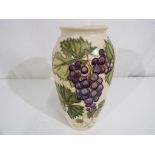 Moorcroft - a Moorcroft pottery Collectors Club vase,