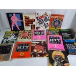 A quantity of music related books, predominantly paper back to include Rock Archives,