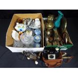 Two boxes containing a good mixed lot of glassware, ceramics, brassware,