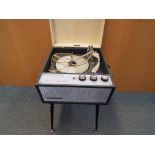 A vintage Dansette Challenge Elite Record player, Est £20 - £40.