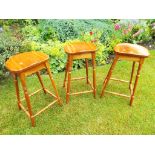 Three bar / kitchen stools,
