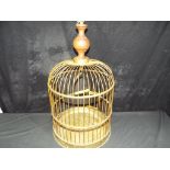 A round brass bird cage