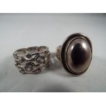 Jensen - a Georg Jensen silver evening ring, stamped 925, size O,
