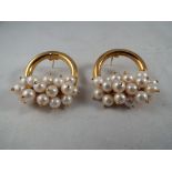 A pair of lady's 18ct gold Le Gi earrings set with pearls, approx weight 8.