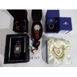 A good mixed lot to include a Shudehill enamelled mirror, a modern wristwatch with leather strap,