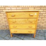 A pine chest of four drawers measuring 93 cm x 92 cm x 46 cm.