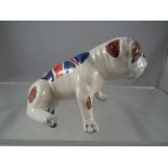 A ceramic Carlton Ware bulldog figurine.