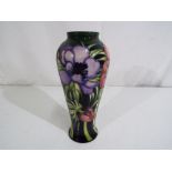Moorcroft - a large Moorcroft Pottery vase in the Anemone Tribute pattern approx 20.